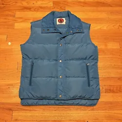 VTG 80s Mountain Goat Sky Blue Down Fill Puffer Vest Size Large. Very Good Condition, No Pinholes, No Rips or Tears, No...