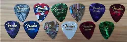 12 guitar picks from different colors (Color choices may vary). NEW FENDER PREMIUM PICKS.