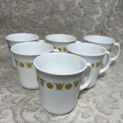 These original and decorated mugs were manufactured in 1972 in the United States using the fused glass technique.