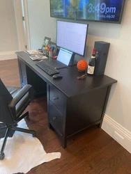 Ikea Black Desk in Fair Condition PLEASE NOTE: SHELF FOR BOTTOM LEFT IS MISSING SOME FADED PAINT: SEE PICS 62.5