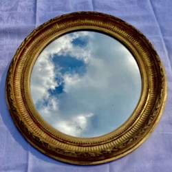 Ancien cadre miroir ovale. Pierre Guariche, Olivier Mourgue. En bois doré. Knoll,Panton, Poulsen, Jacobsen, Perriand,...