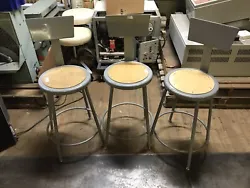 Set of three industrial work chairs that can be repurposed as bar stools or other use. Great steam punk look. Two of...
