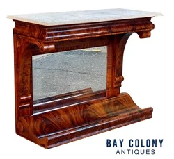 The table is adorned with crotch Mahogany veneers on almost every surface and the table has aged very well. The table...