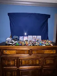I am selling a bunch of different Skylanders stuff including characters, magic items, crystal traps, vehicles, creation...