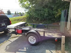 5x10 Utility Trailer for sale. Was custom built with car axle under it. Springs are in good shape. Has drop down gate...