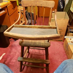 Antique Solid Wood Childs High Chair with hinged plate holder. Very nice shape...very solid. Dont know the wood kind...