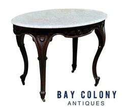 The smoke colored natural veins are plentiful on the thumb molded marble top & create a nice visual effect. We handle a...