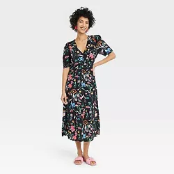•Puff short-sleeve A-line dress •Lightweight fabric •Flattering V-neckline •Comes with ruched front •Features...