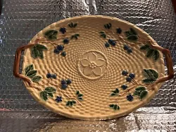 Gorgeous Tiffany & Co., yellow basketweave oval platter with handles. Decorated with 3D blackberries vines, and leaves.