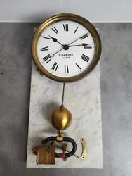 Superbe horloge électrique Charvet Lyon. elle est sur son support en marbre. elle est en bon état esthétique.