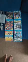 wii u 32gb console with 6 games and gamepad.