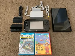Nintendo Wii U 32gb Console (Black). Super Mario Maker(case has wear). Nintendo Land(case has wear). Everything is in...