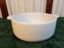 This is a beautiful 1.5 quart World Market double handled ceramic bakeware round casserole bowl in a white color....