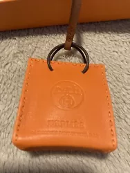 Hermes Orange Bag Charm - New in Box.I’ll ship in the original box with ribbon but won’t include the receipt as I...