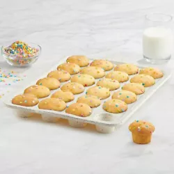 This Trudeau Crave Silicone 24 count Confetti Mini Muffin Pan is so easy to use, all you need to do is butter or grease...