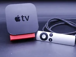 Apple tv with oem remote, tested and working. Has visible ware from use.  Works great for turning older tvs into smart...
