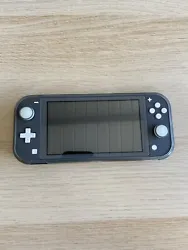 Nintendo Switch Lite - Gris. Comme neuve, vendue avec protections (protege écran, coque, housse de transport)