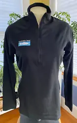 In excellent preowned condition. Barely any signs of wear. Black, long sleeves, quarter zip. Style 44451 FA13.