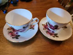 Please review item condition and photos carefully. This is a lovely set of two cups and two saucers. Please ask any/all...
