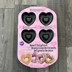 NEW Wilton Nonstick 6-Cavity Heart Donut Pan #2105-0632Condition NEWAs pictured. SHIPS FAST with USPS Priority Mail Buy...