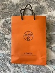 Hermes Orange Shopping Gift Paper Bag Approx 11.5 x 8.5Used. Bag has signs of wear in creasing. Bag comes as it appears...