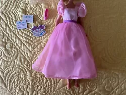 No Doll included. Dress, 1 shoe & 2 wedding invite cards.
