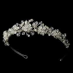 Enchant and sparkle in this floral tiara. Clear Swarovski crystals and stunning rhinestones are arranged into an...
