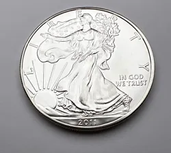 This 2011 American Silver Eagle coin is a beautiful piece for any coin collector or investor. The coin features an...