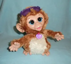 Its glasses and FurReal purple heart are present. Tickle (touch) the monkeys stomach and the monkey giggles and moves....