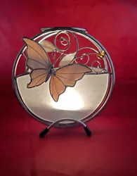 The circular shape and cream color make it a versatile piece that can be displayed in any room. Made of glass, this...