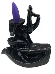 A delicate Hand of Compassion backflow burner. Top hand forms a Yoga Mudra hand gesture with the cone dish behind it....