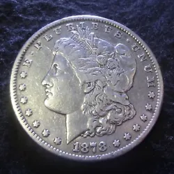 The obverse shows most of her finer hairlines, strong borders on the leaves and cotton, and several of the cotton...