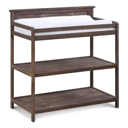 The coordinating, Grayson changing table in Rustic Barnwood finish is the easiest and safest place to change your baby....