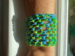Loom Elastic Bracelet - dragon scales blue and green. Handmade by children, raising money to save.