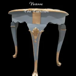 The table is fully assembled and features a painted finish in a beautiful french blue color, making it a perfect...