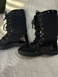 Winter will be here before you know it. These boots are used but in good shape. The black signature C logo all over...