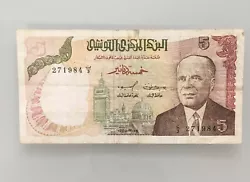 Billet Tunisie 5 Dinars Président Bourguiba no 271984 du 15/10/1980. Pliures, salissures, 3 épinglages