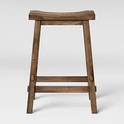 •Solid-hued wooden counter stool with distressed finish •Hardwood frame offers sturdy, stable support •Curved...