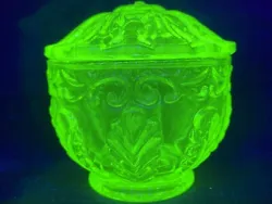 Green Vaseline glass covered jar/dish. It is very elegant.