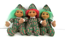CANDY CANE PJS. They have candy cane pjs and little matching hats. RUSS TROLL. CHRISTMAS ELF DOLLS.