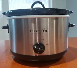 Manual Slow Cooker in Silver & Black. High, Low & Warm Settings. Gently used condition. Black Stoneware Insert is Oven...