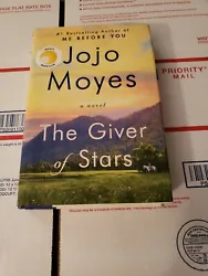 The Giver of Stars, Jojo Moyes, Hardcover, Great condition!!.  I did notice a few pages have some underlining in pencil...