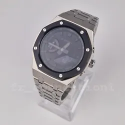 Bezel colour: Black. Bezel and case materials: Stainless steel. The original Casio G-SHOCK GA-2100-1A1 box with the...