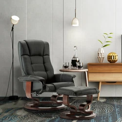Crafted from a solid wood frame, it features foam-filled faux leather upholstery awash in a solid neutral finish. It...