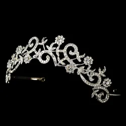 Charming silver plated vines and rhinestones make this piece perfect with either you ivory or white wedding dress....