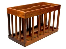 Teak magazine rack, Goodwood. The teak magazine rack has a Danish. in very good condition.The rack is. 18 3/8