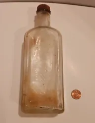 This bottle has been under ground over 70 years .  So it has some scratches but its not cracked anywhere.There is a...