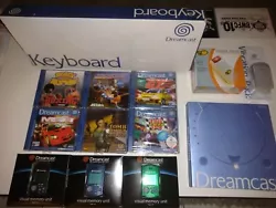 Collection Sega Dreamcast Neuf Scellé. 1 clavier, 2 vibreur, 6 jeux scellé, 3 vmu couleur. Et le livre dreamcast 412...