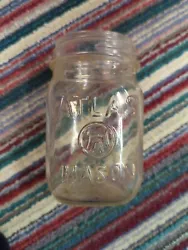 The jar features the iconic Atlas logo and was made in the United States, adding to its. historical significance.