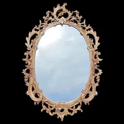 Fantastic large and ornate vintage mirror! This is done in the rococo with lots of details made to mimic carved wood,...